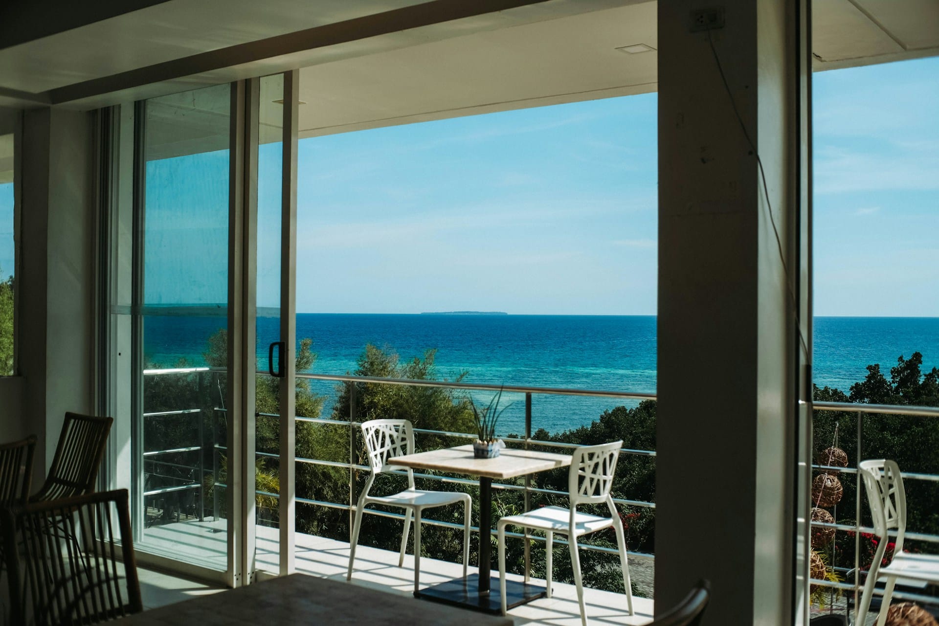 Sliding doors to balcony with a spectacular sea view